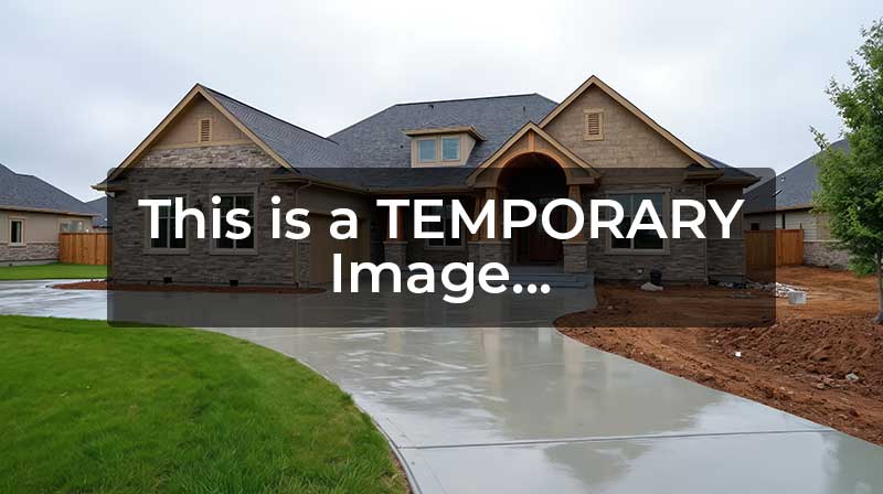 Stamped concrete patio with outdoor furniture