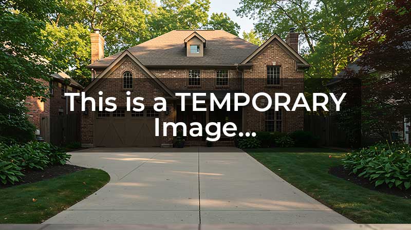 Concrete garden path next to landscaping